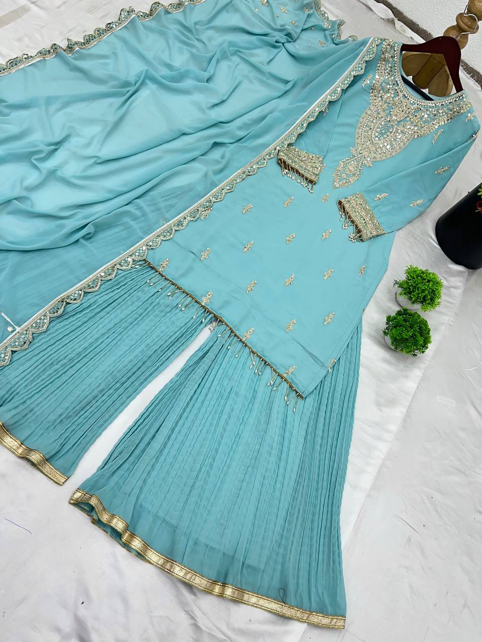 Sky color georgette sharara suit with dupatta