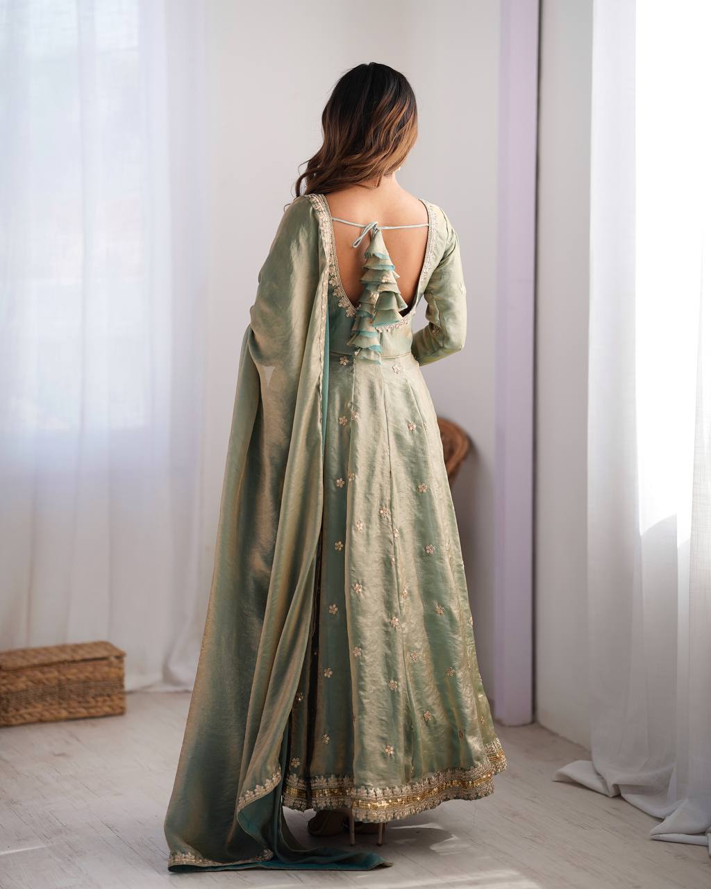 Green color fandy silk gown with dupatta images