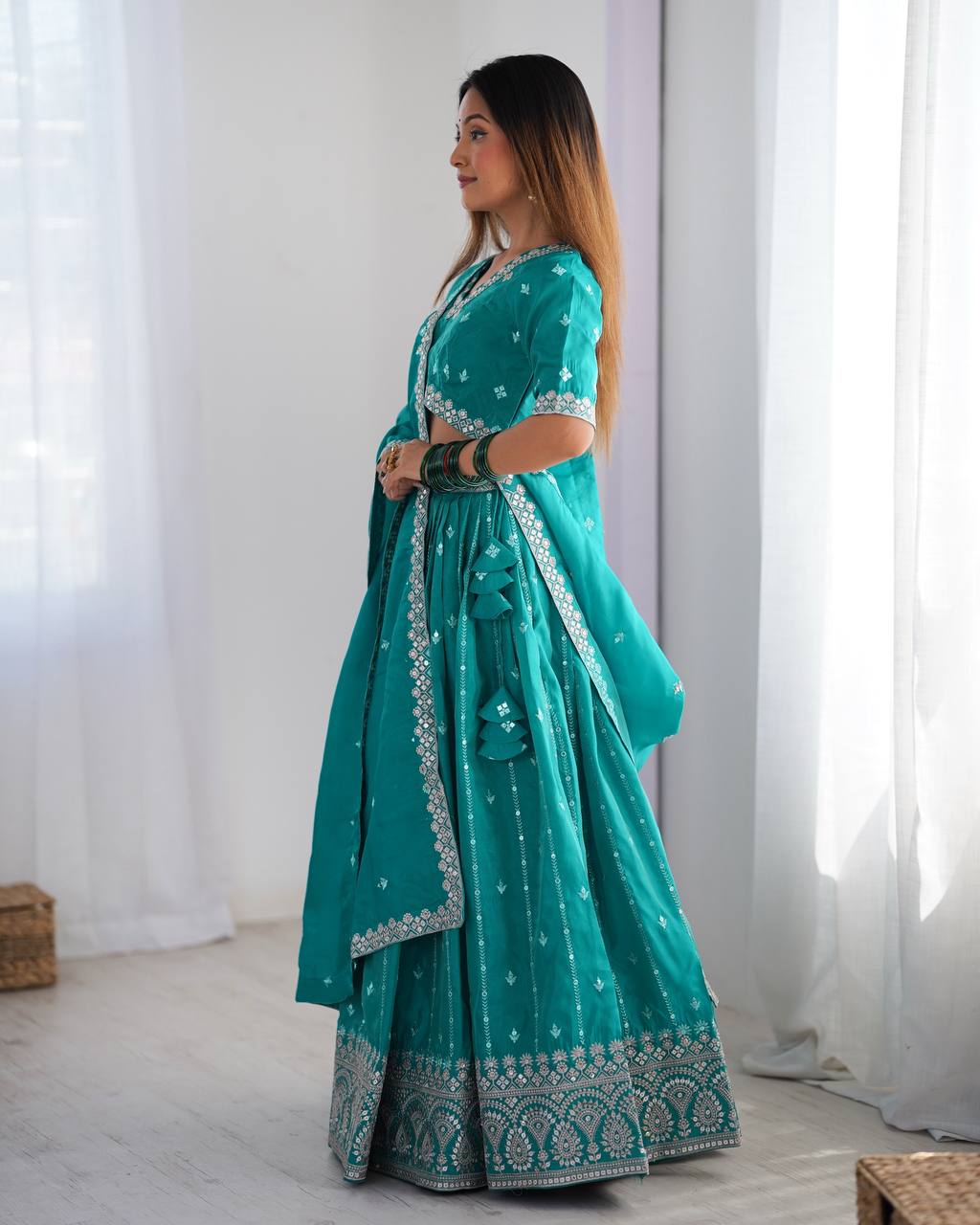 Rama shimmer silk chaniya choli for party
