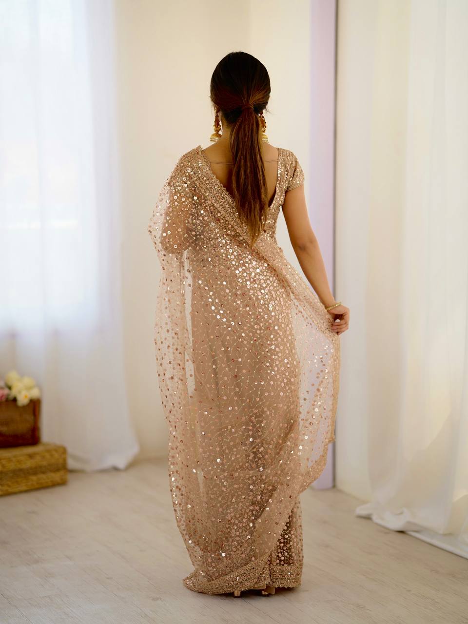 Beige color net saree for party