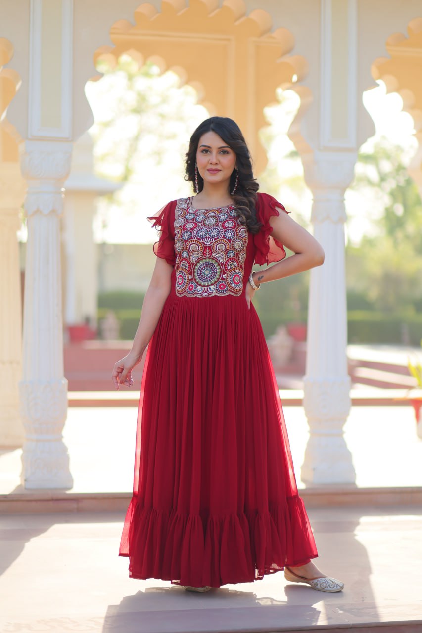 Maroon color designer gown