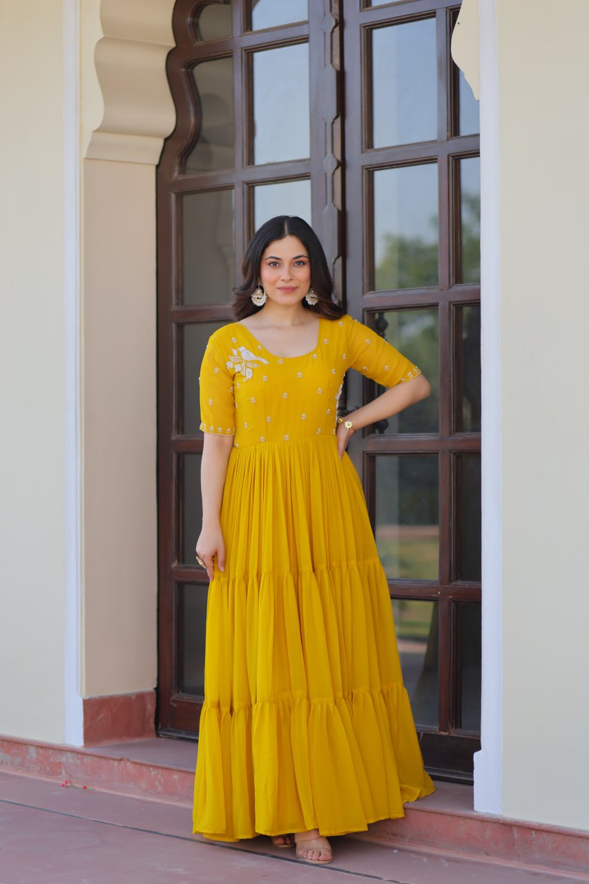 Yellow color embroidery work gown