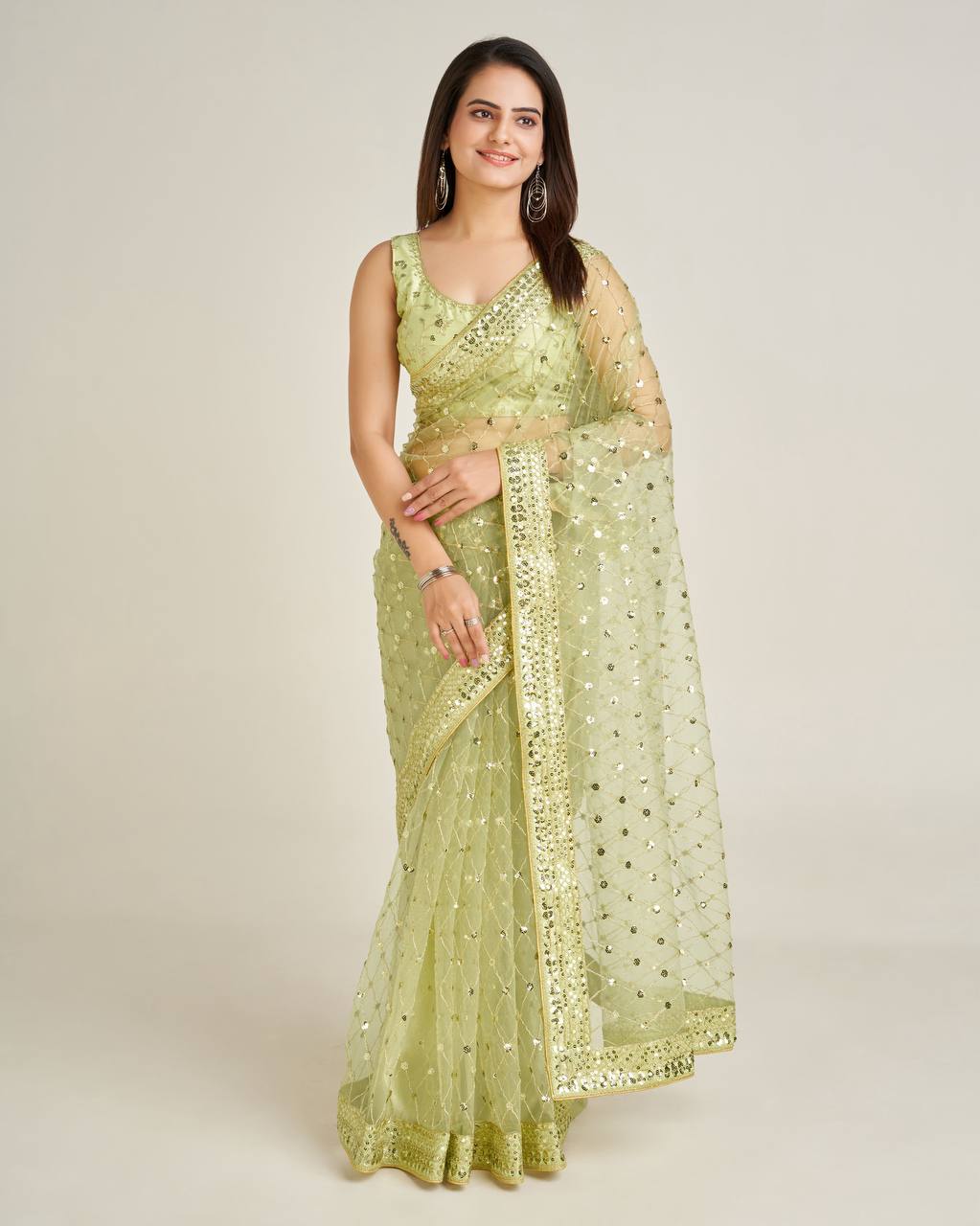 Green color net saree with blouse