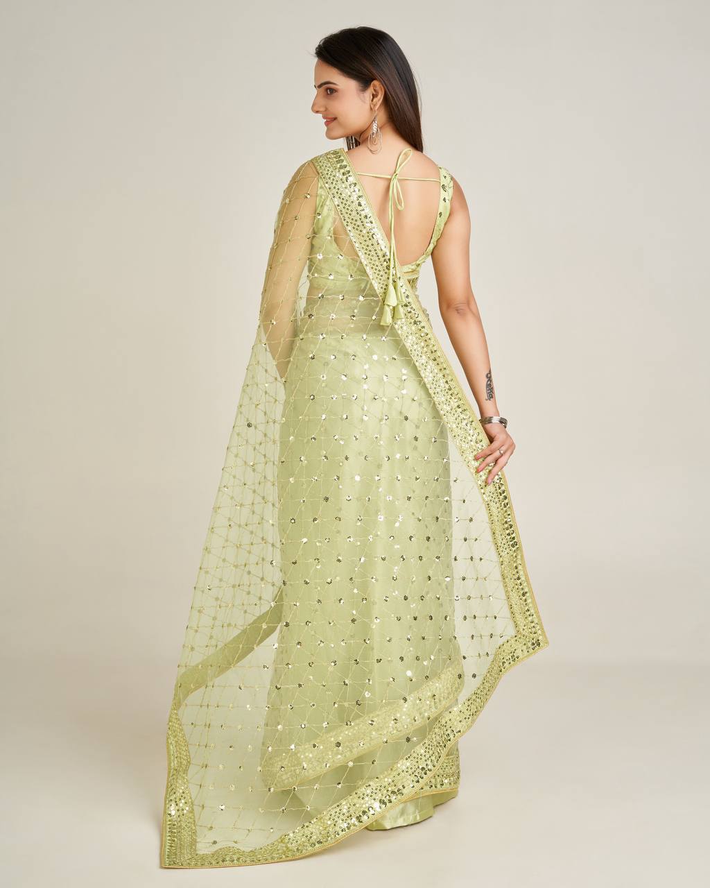 Green color sequins work saree for wedding