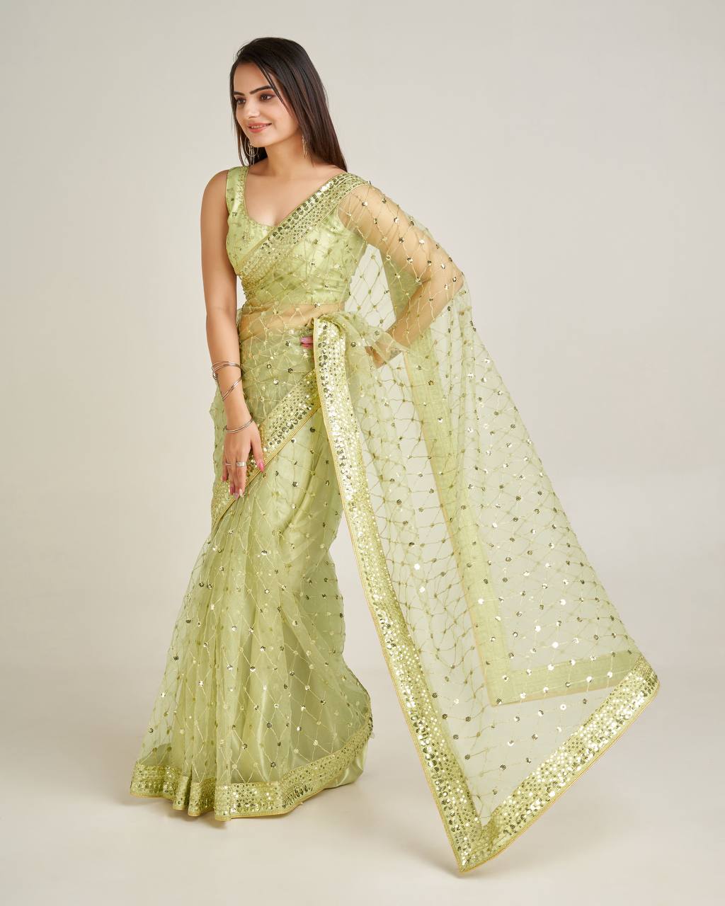 Green color net saree with blouse for party