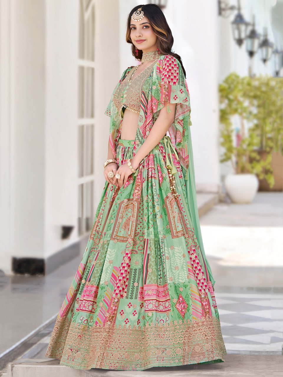 Green embroidery work lehenga