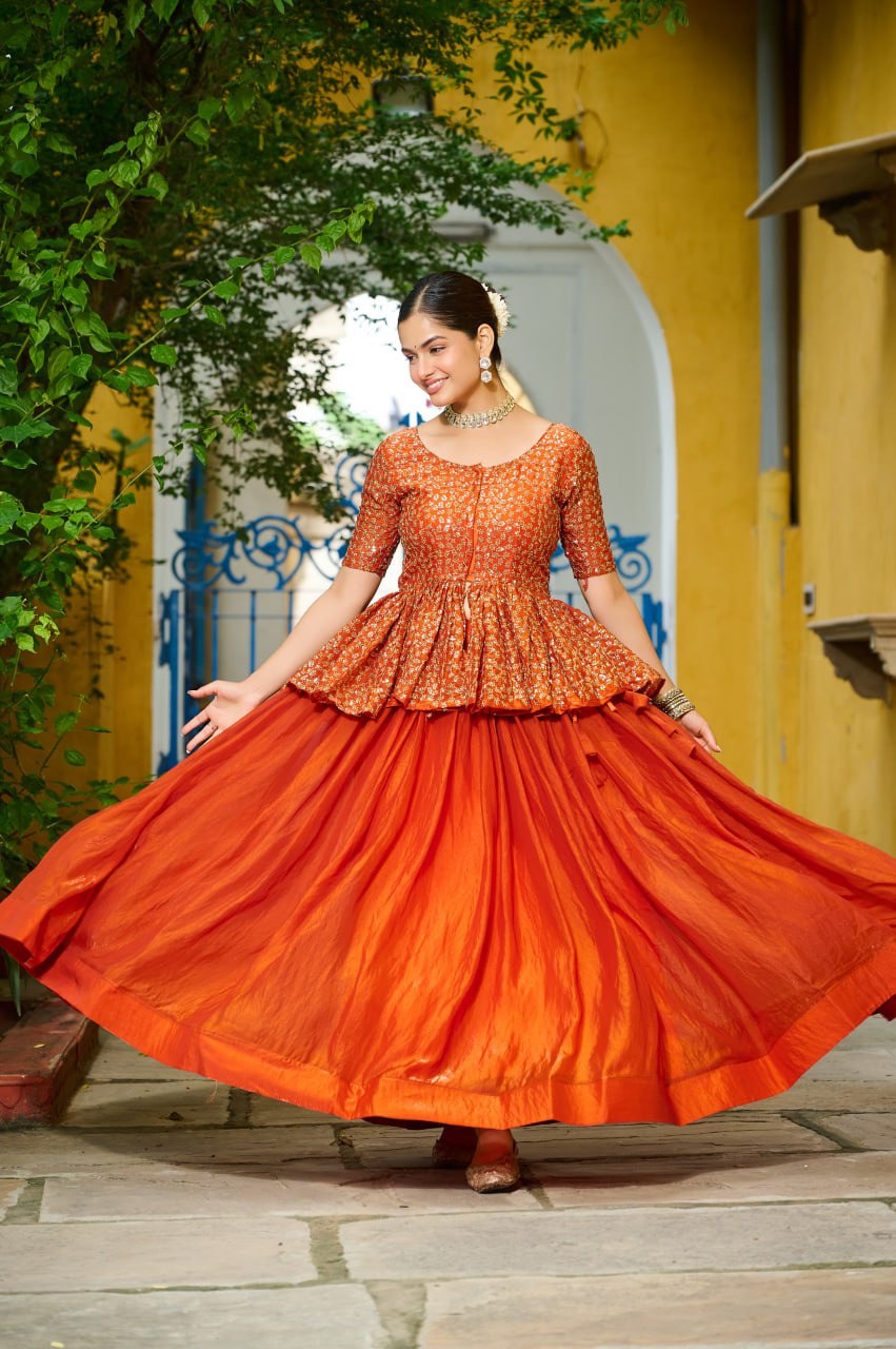 Orange color embroidery work lehenga