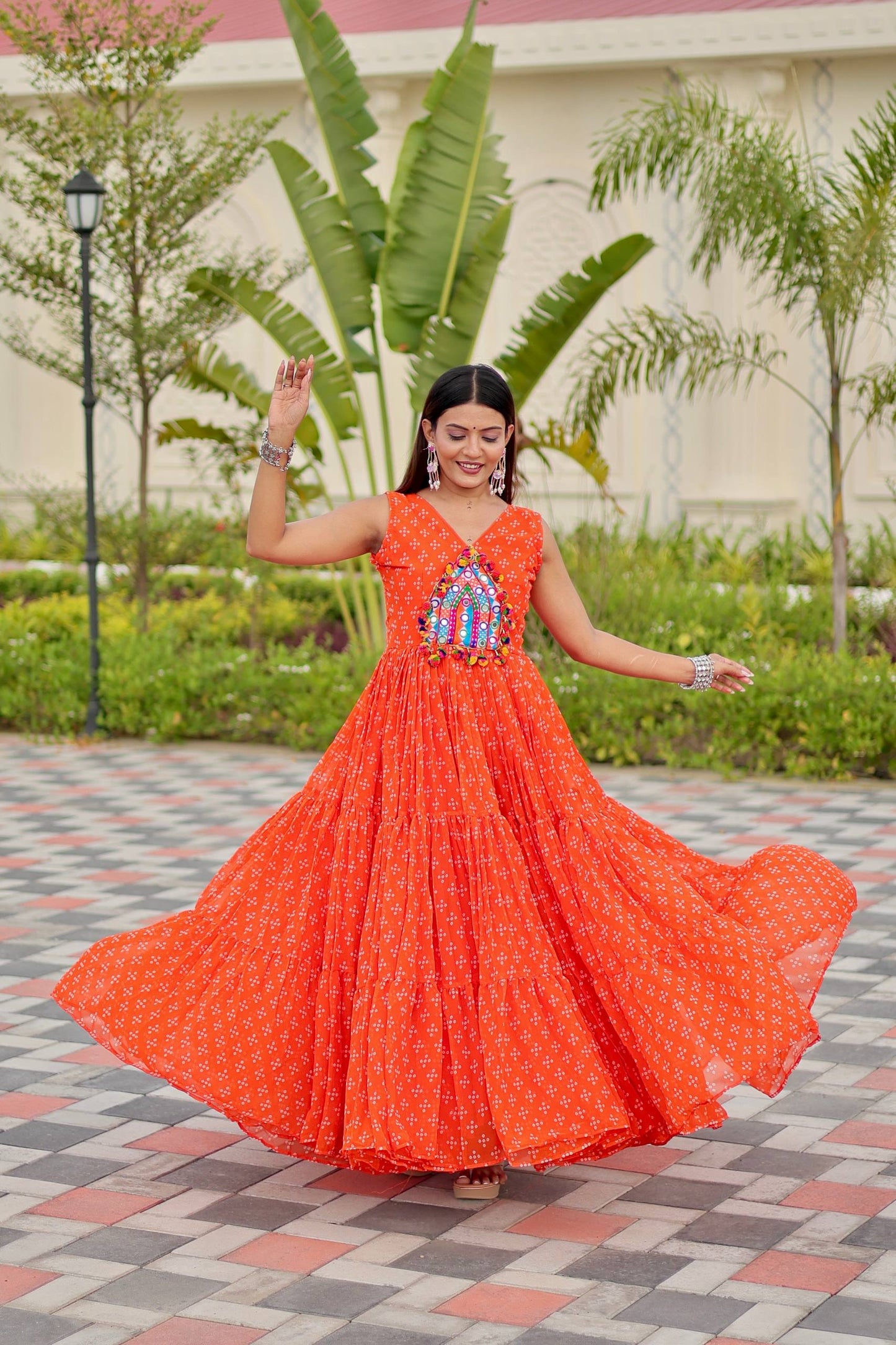 Orange Color Georgette Stitched Gown For Festive