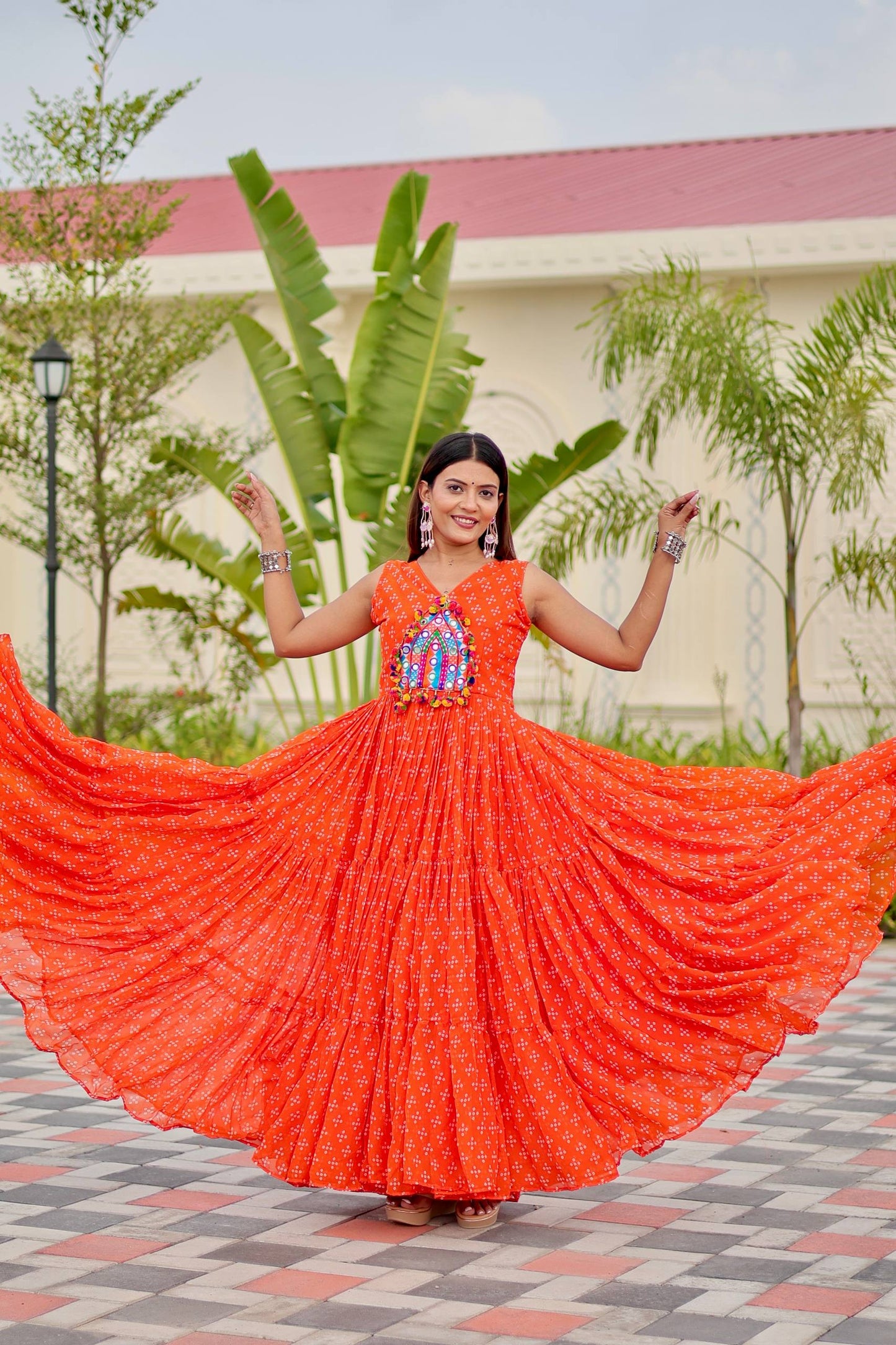 Orange Color Georgette Stitched Gown For Festive
