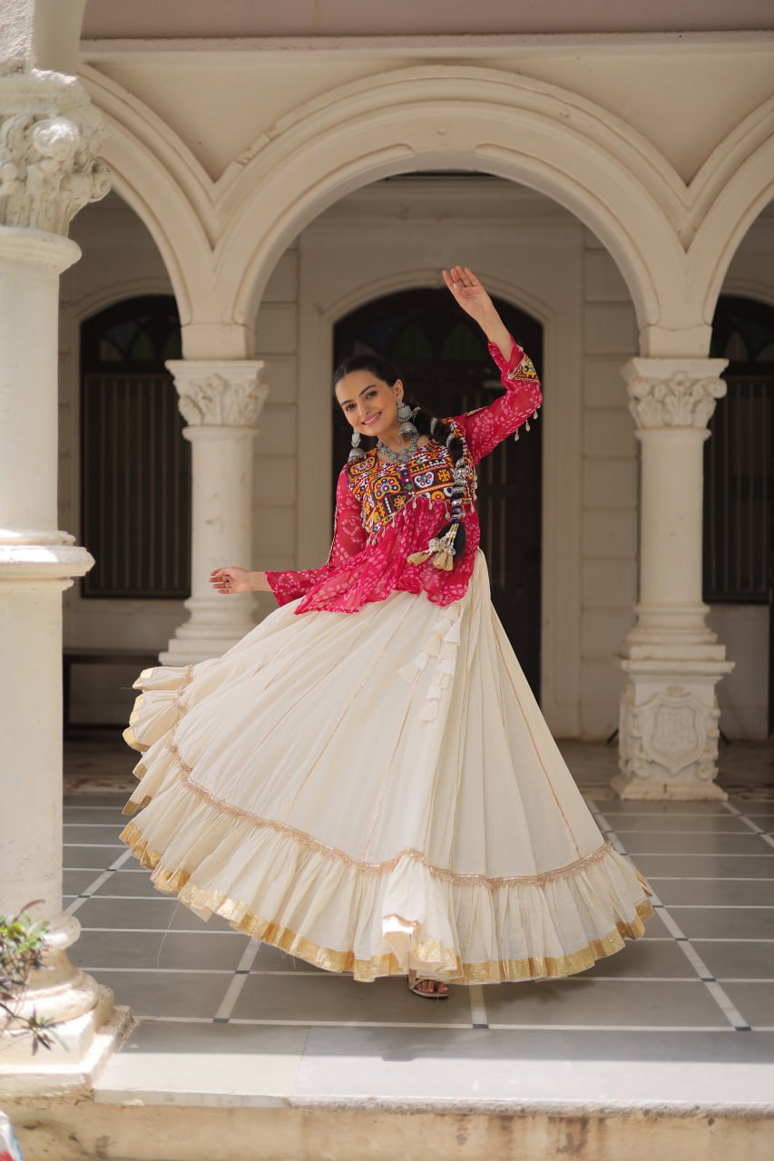 Pink color bandhani printed lehenga with top