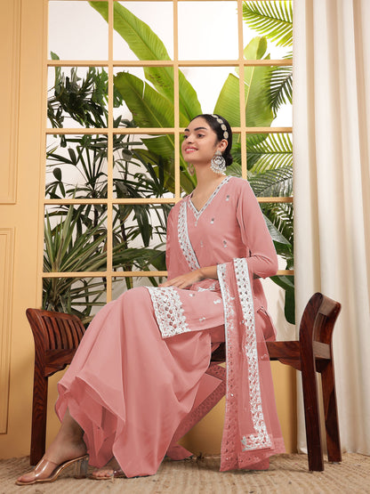 Peach color georgette sharara suit with dupatta