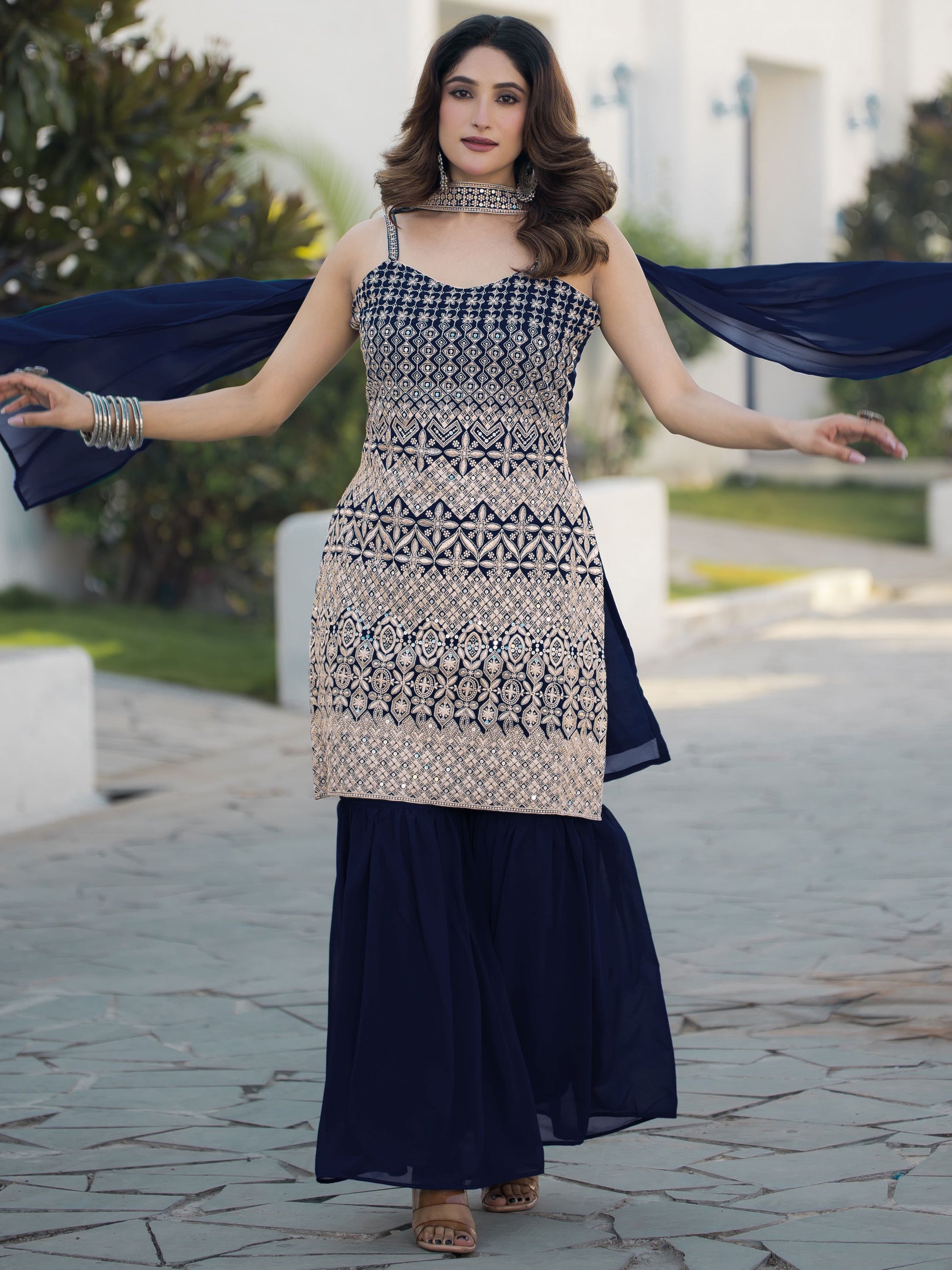 Navy blue color georgette sharara suit with dupatta