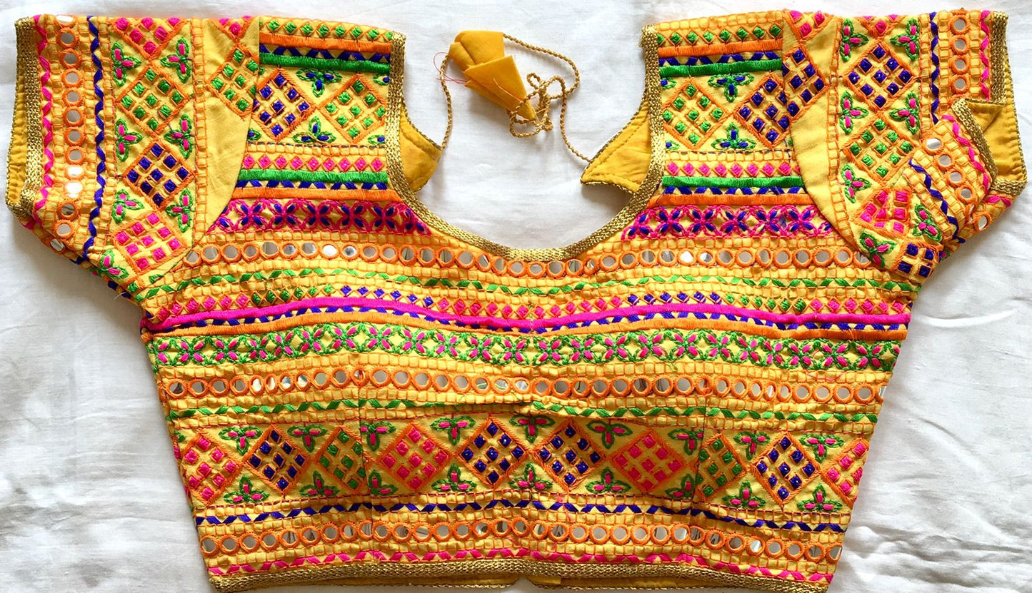 Yellow color Silk mirror work blouse 
