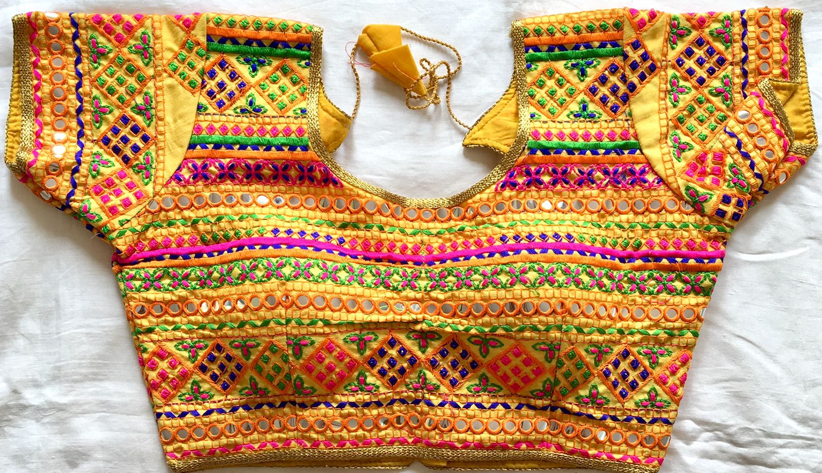 Yellow color Silk mirror work blouse 
