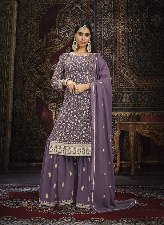 Lavender color georgette sharara suit with dupatta
