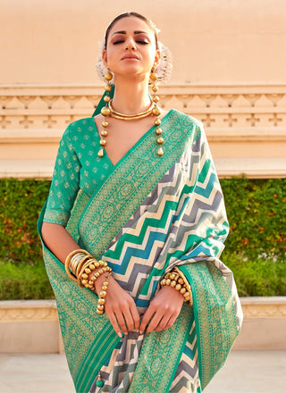 Teal green silk saree with blouse images