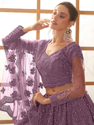 Purple color soft net lehenga choli for wedding wear