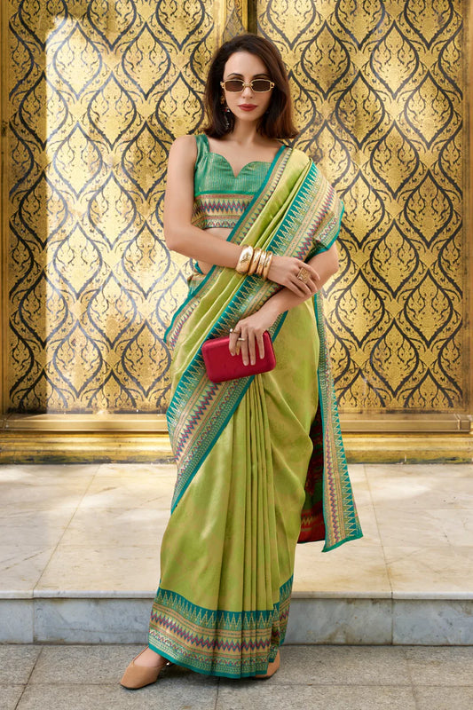 Green color tissue silk saree for wedding