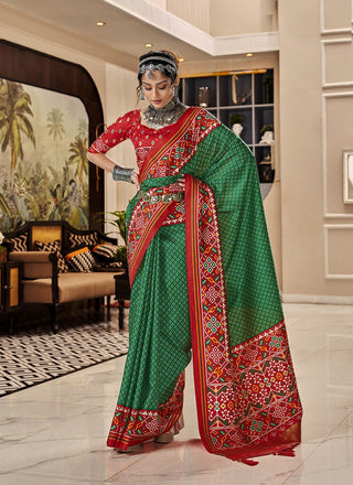 Green color fancy patola printed sarees images