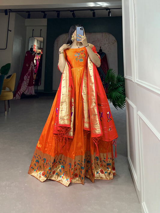 Orange color jacquard silk gown 