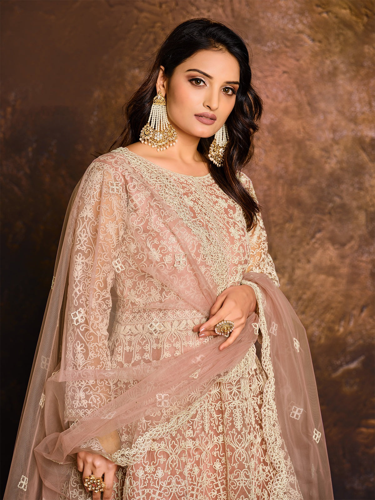 Peach color net gown for women wedding
