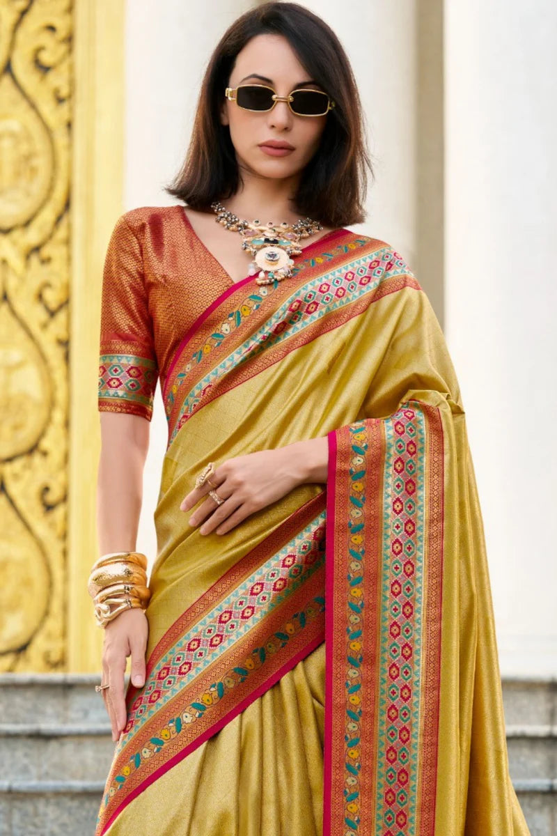 Golden color tissue silk saree for wedding