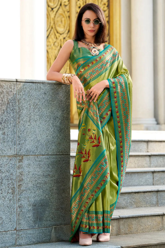 Parrot green color tissue silk saree for wedding
