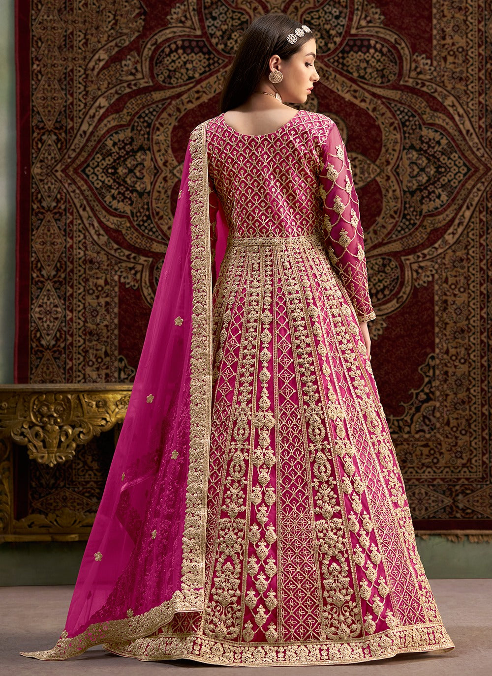 Pink color net gown for party
