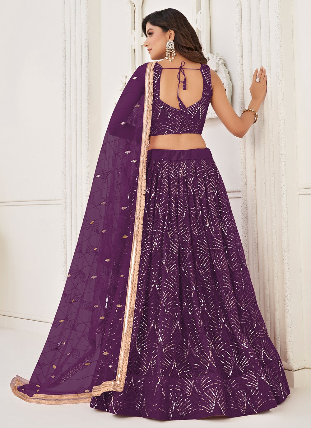 Wine color butterfly net lehenga choli for wedding