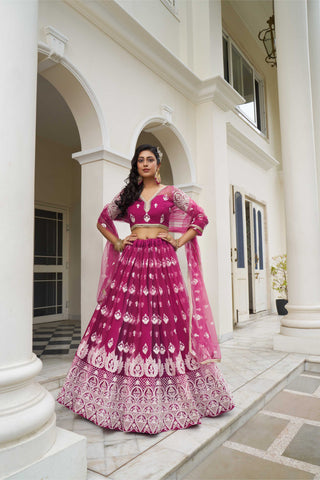 Dark pink color net lehenga choli for women
