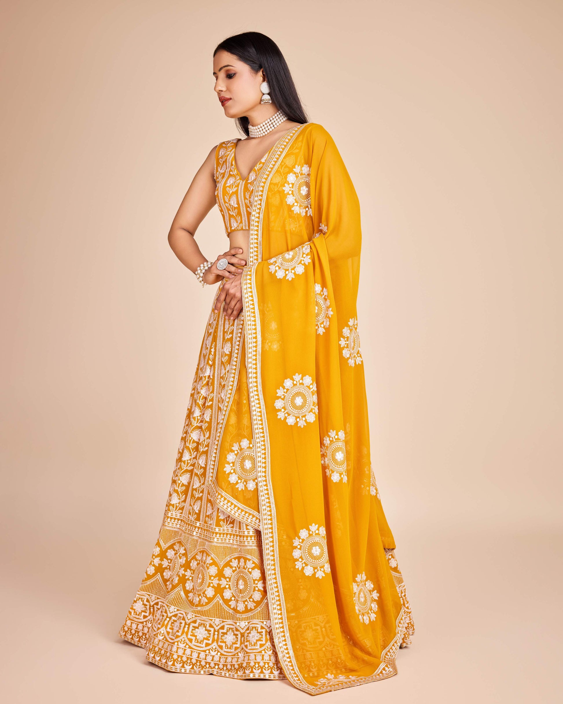 Yellow color georgette lehenga choli for wedding
