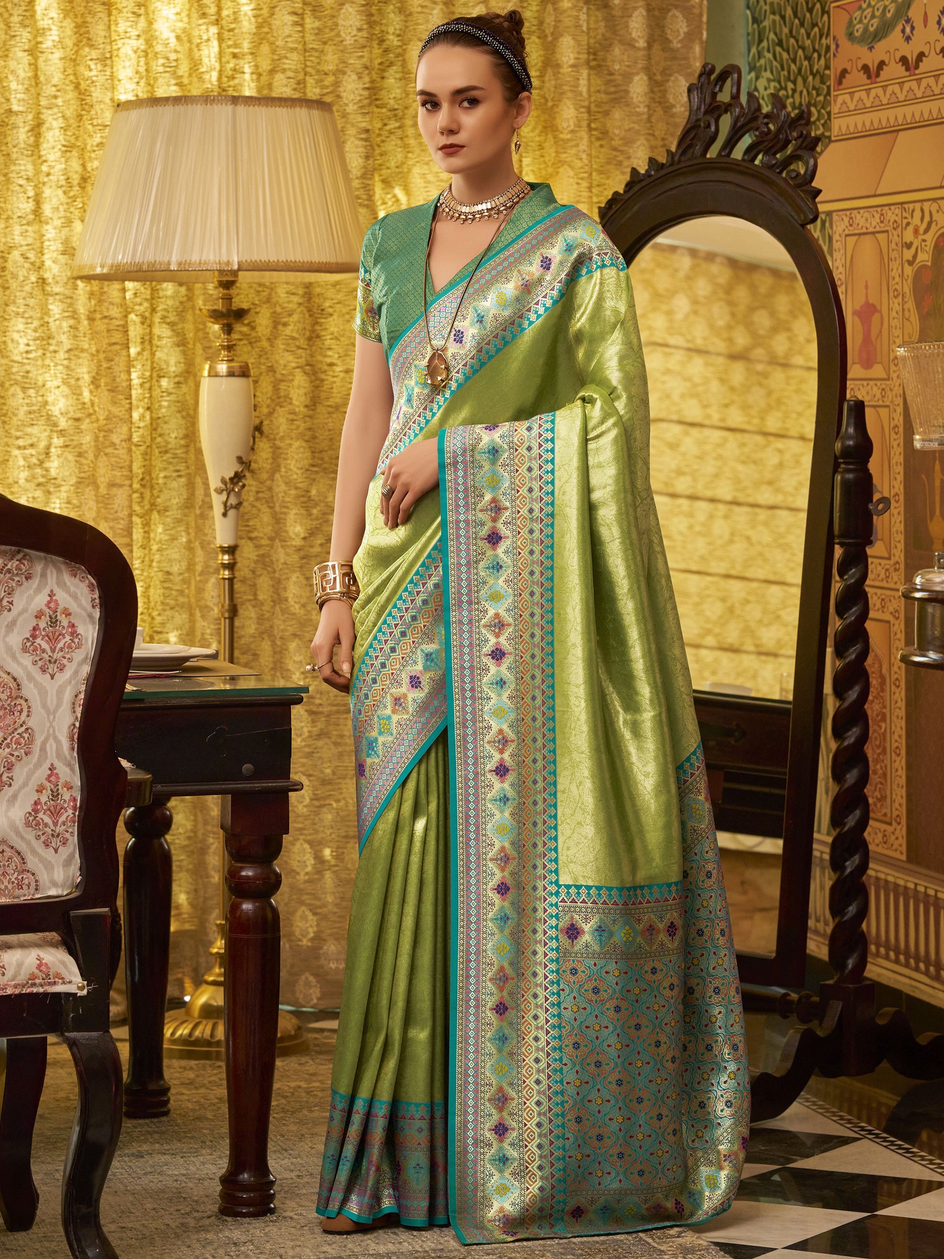 Green color tissue silk saree for women