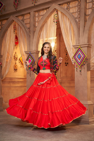 red lehenga choli with koti