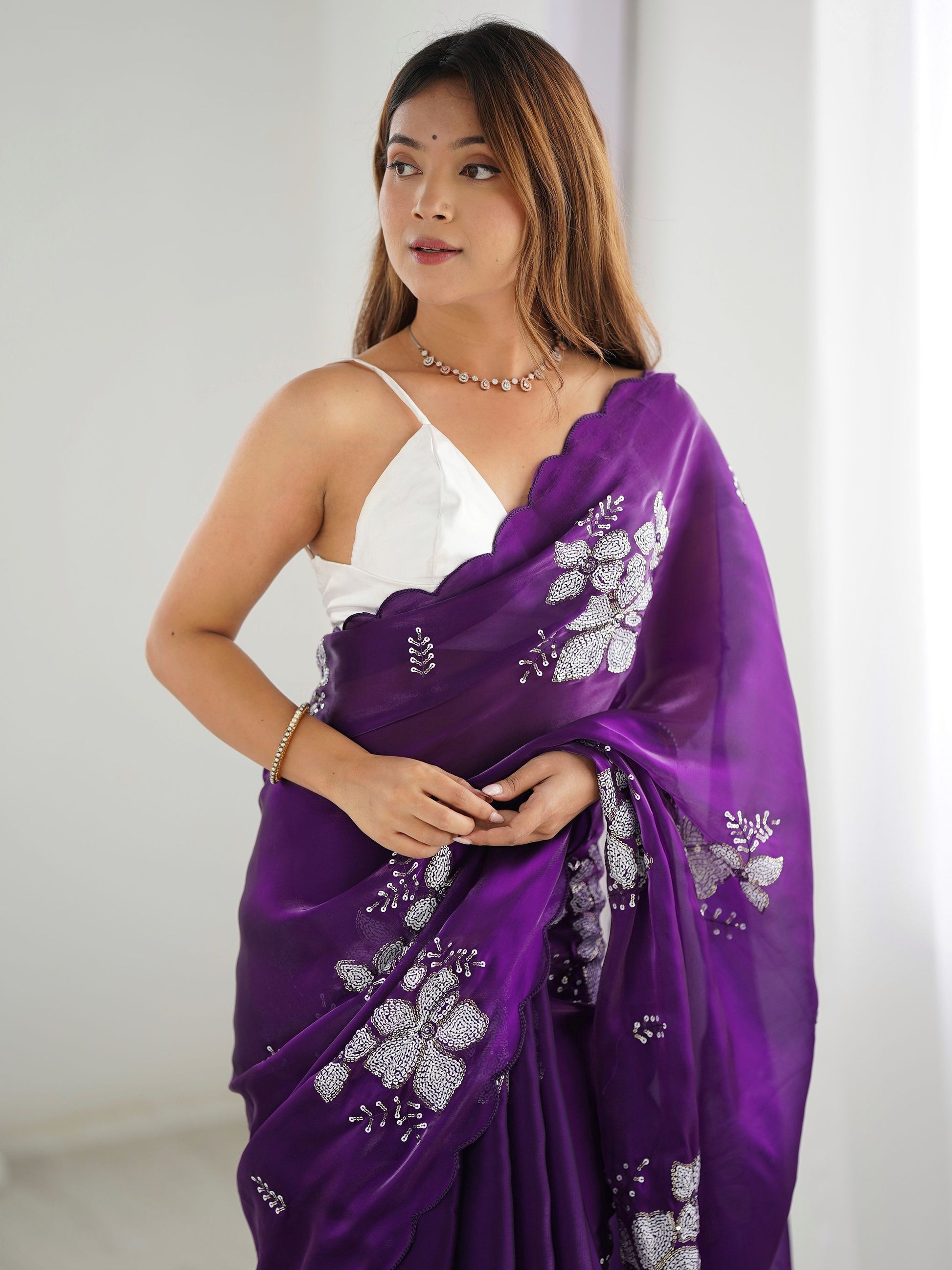 Purple color jimmy choo saree for women 
