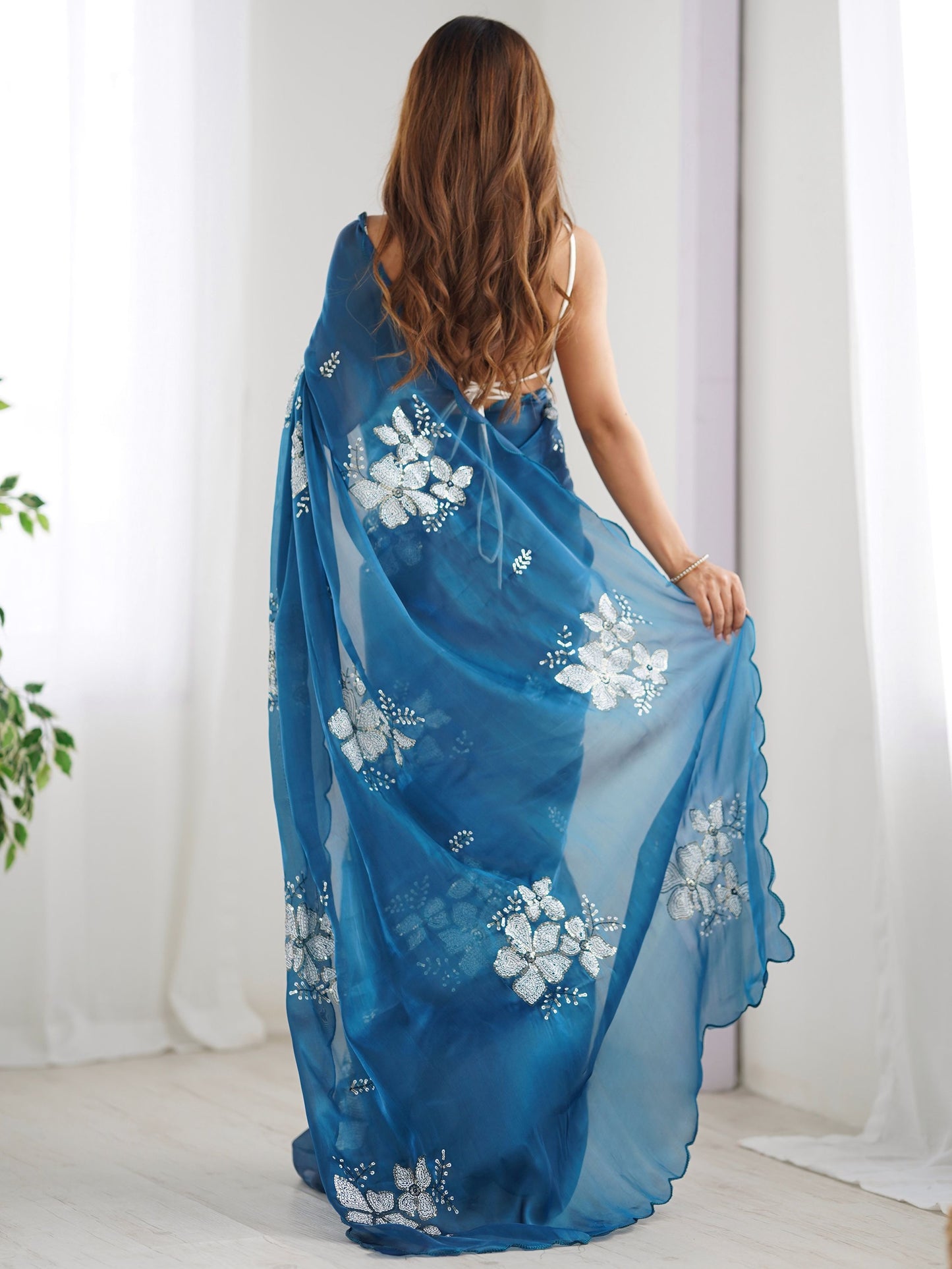Blue color jimmy choo saree for wedding