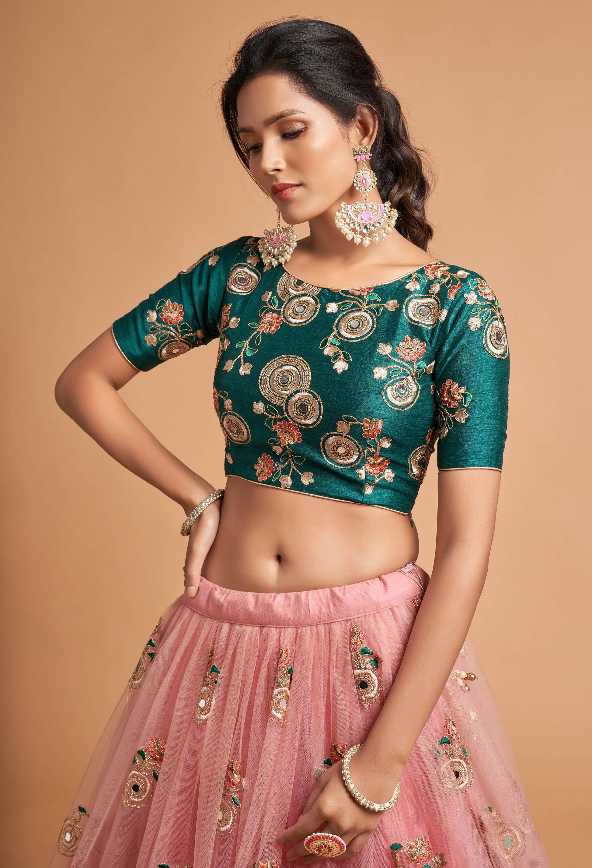 Peach color Lehenga with contrast blouse