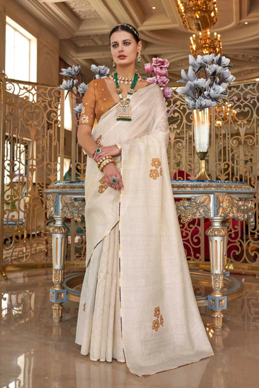 Beige color tussar silk hand touched work saree for women