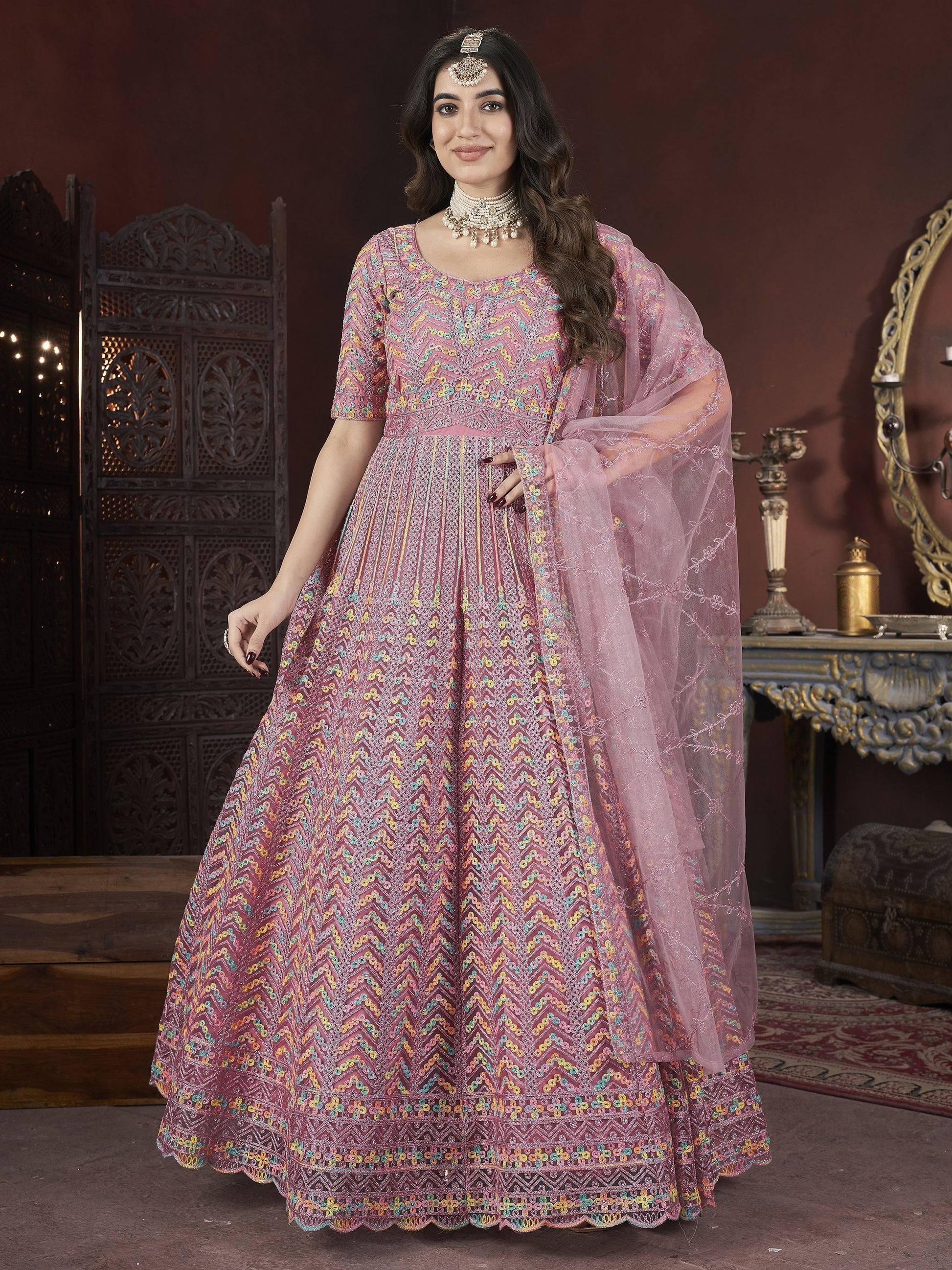 Long sleeve peach color net gown for women
