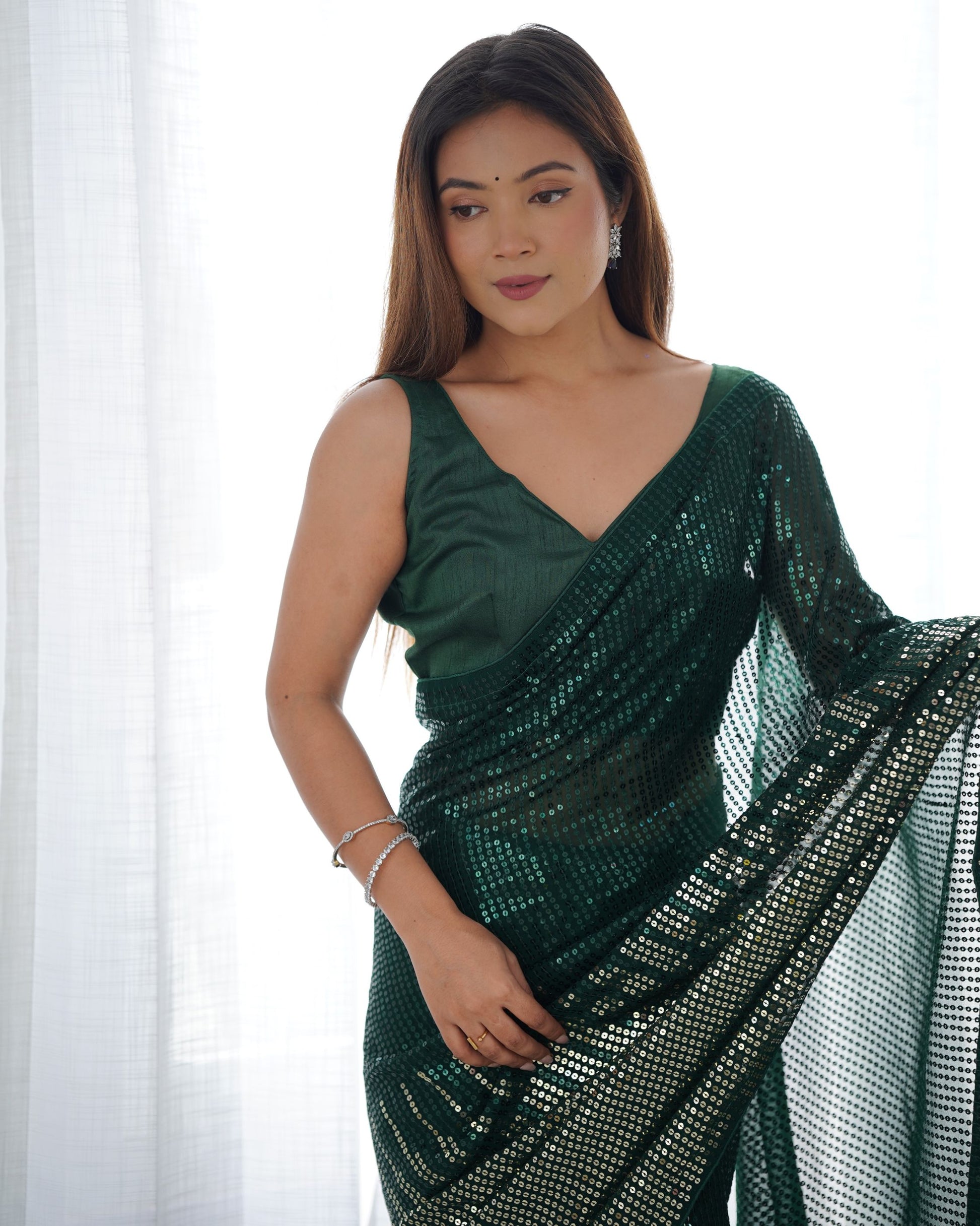 Dark green Georgette Saree images
