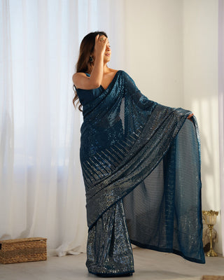 Teal blue color georgette saree