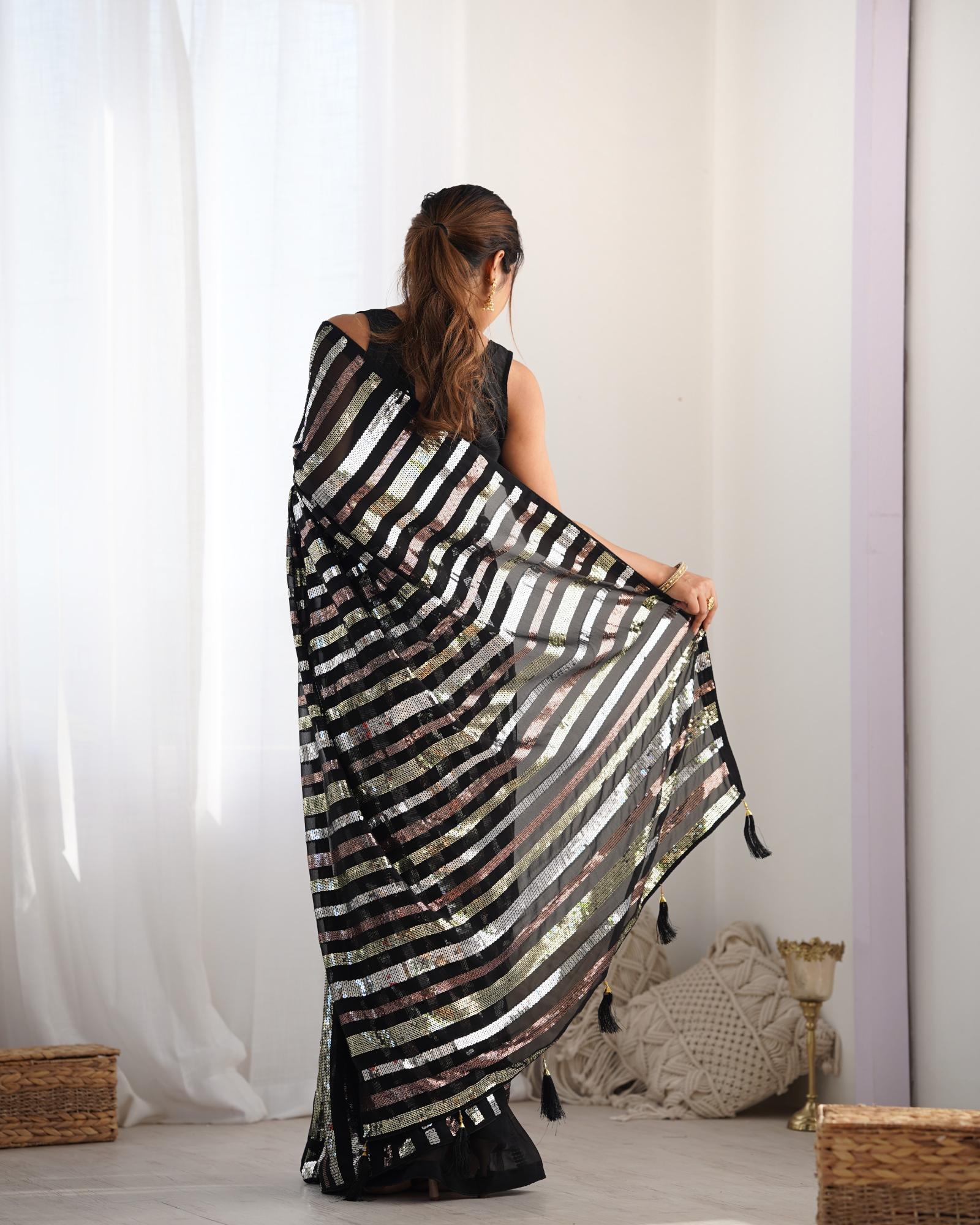 Black color georgette saree for reception
