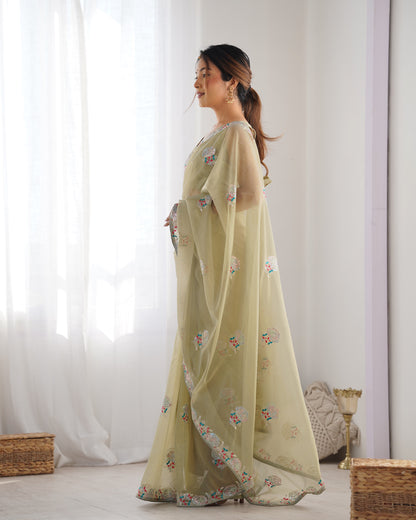 Pista color gold twill net saree for wedding