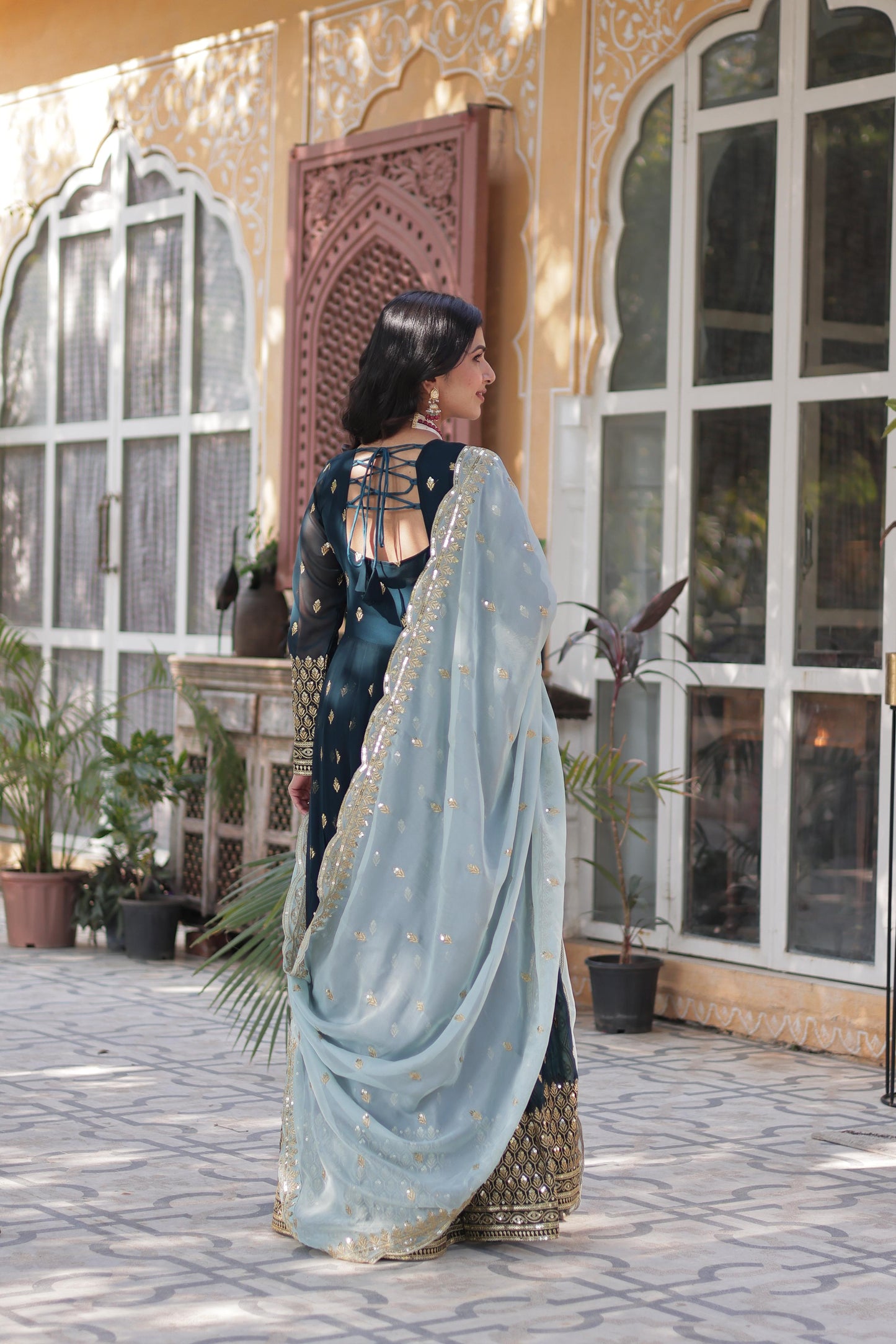 Teal green faux blooming gown design
