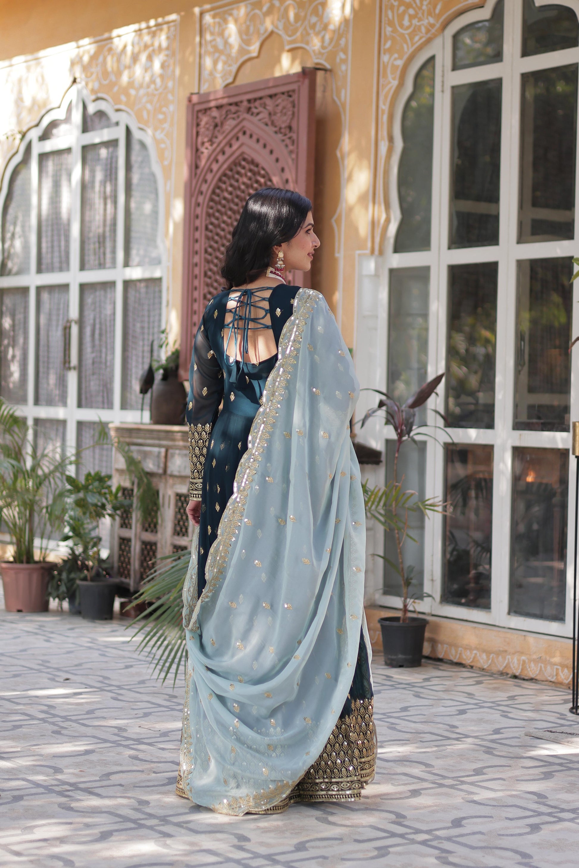 Teal green faux blooming gown design
