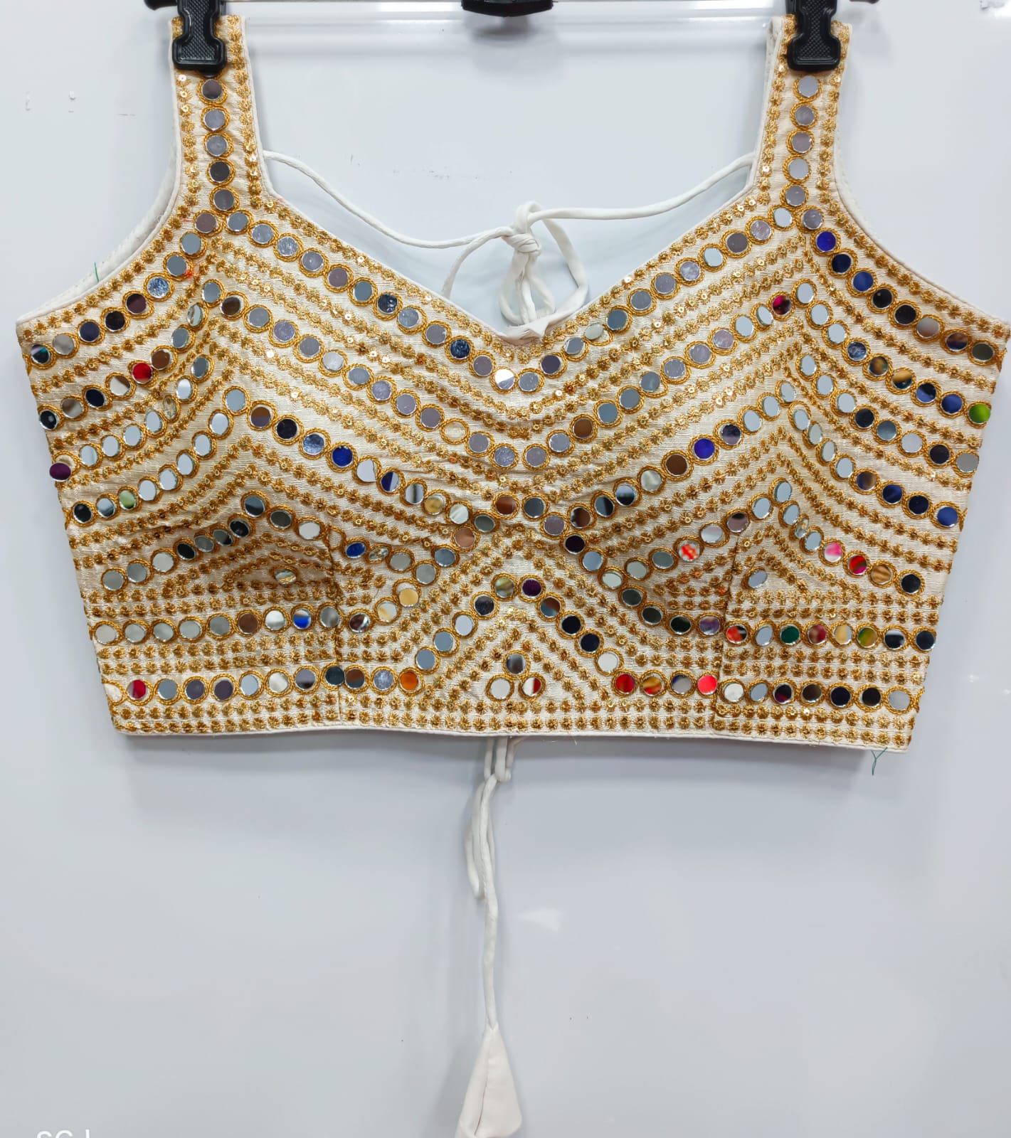 White color silk mirror work blouse for garba night