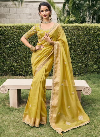 Yellow color tissue silk saree 