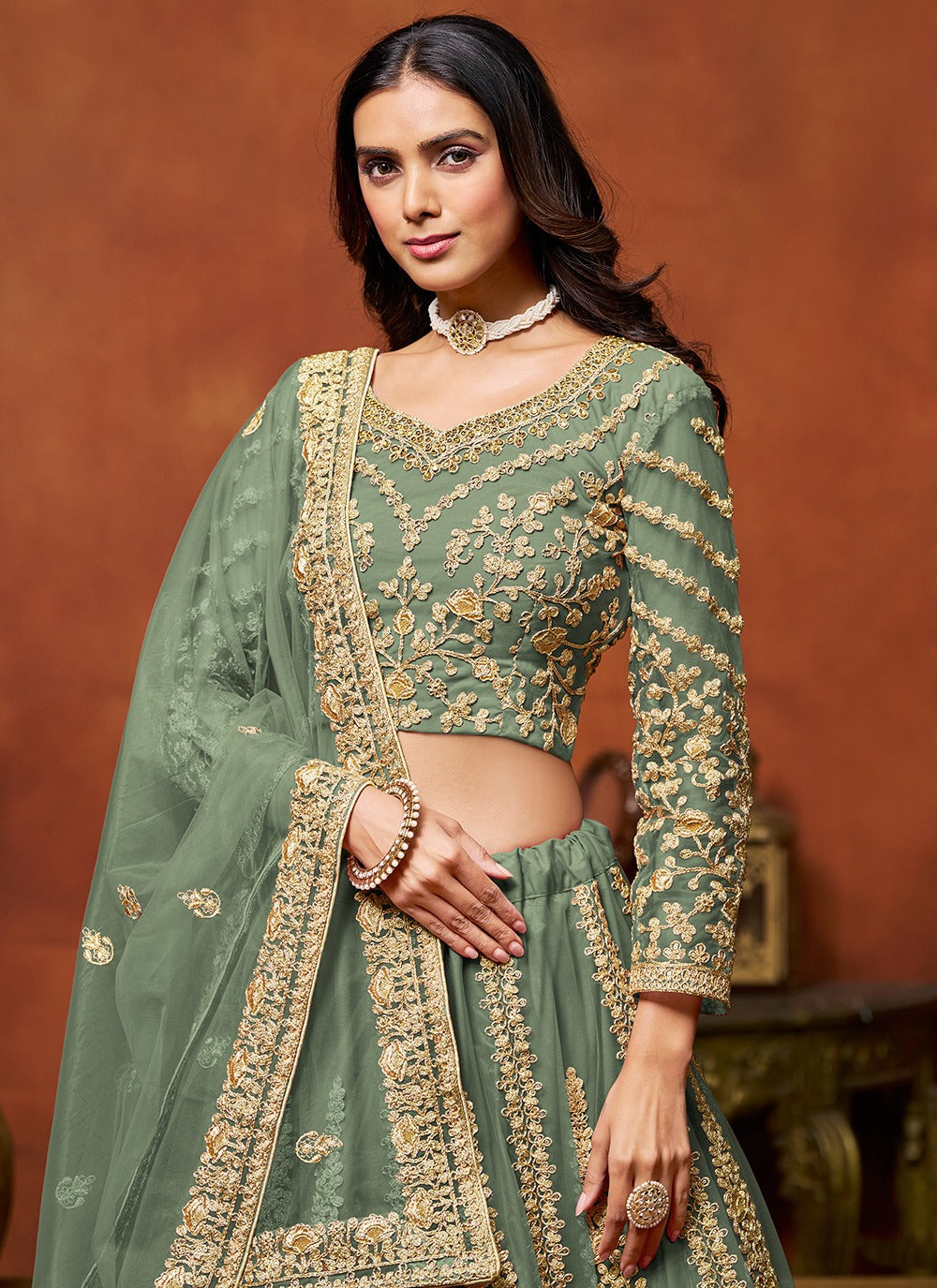 Green color net lehenga choli for wedding
