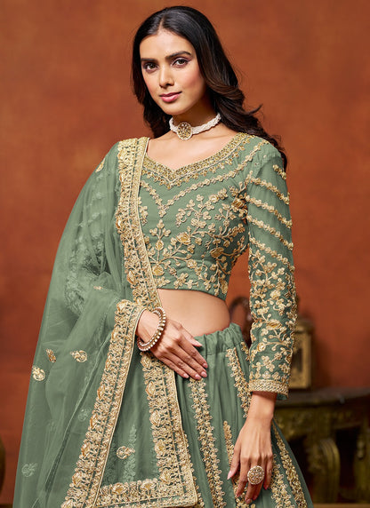 Green color net lehenga choli for wedding
