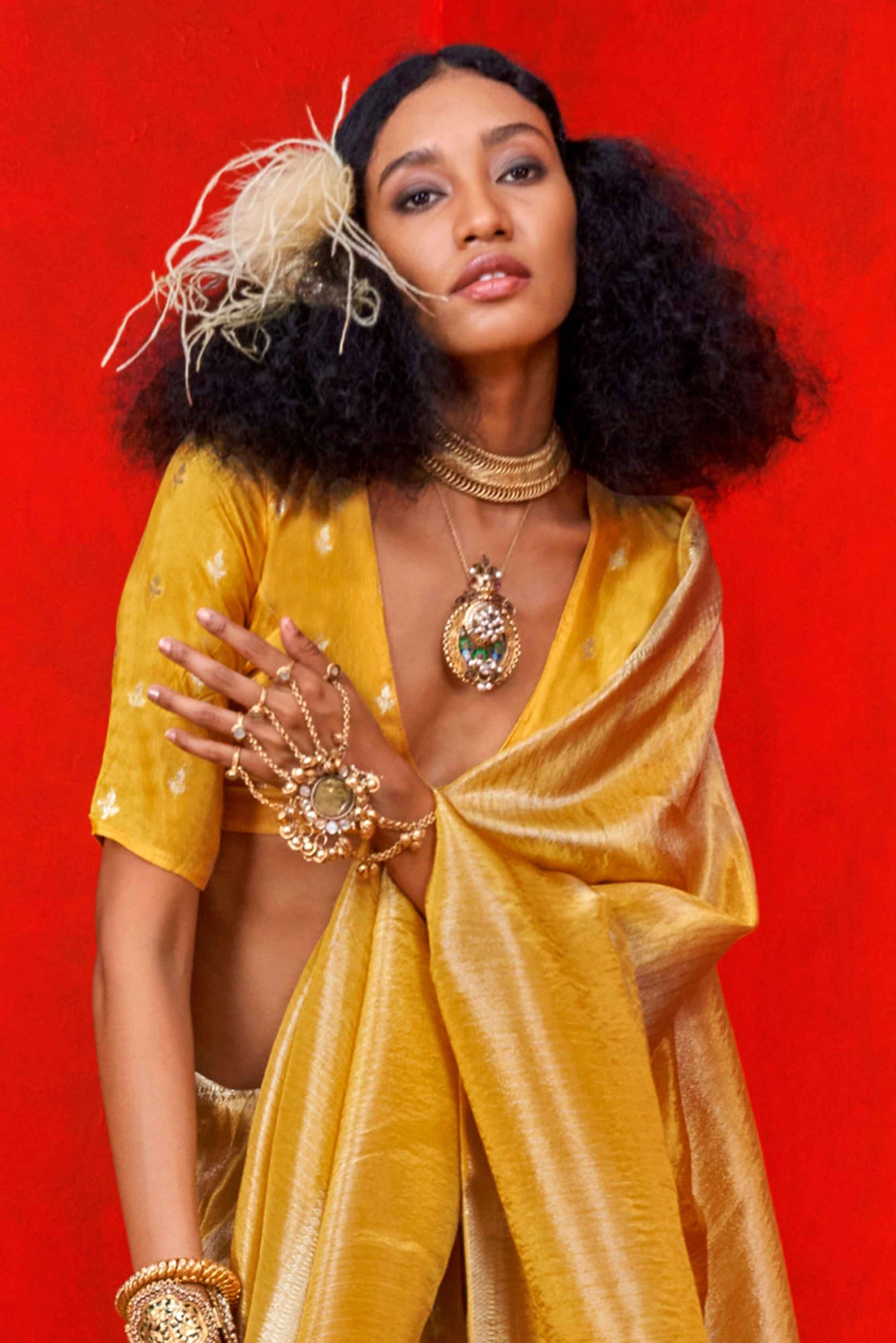 Yellow color viscose tissue saree for party
