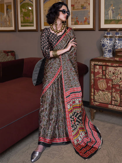 Black color satin crepe patola printed saree for women price
